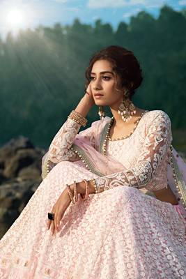CAPTIVATING LIGHT PINK SEQUINS, ZARI, AND THREAD EMBROIDERY NET SEMI STITCHED WEDDING LEHENGA 3