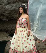 ENGAGING OFF-WHITE SEQUINS AND THREAD EMBROIDERED NET SEMI STITCHED BRIDAL LEHENGA