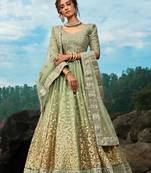 SEDUCTIVE GREEN DORI AND SEQUINS EMBROIDERED NET BRIDAL LEHENGA CHOLI