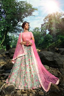 EXQUISITE PISTA GREEN SEQUINS, ZARI, AND THREAD EMBROIDERY NET SEMI STITCHED BRIDAL LEHENGA 1