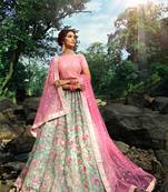 EXQUISITE PISTA GREEN SEQUINS, ZARI, AND THREAD EMBROIDERY NET SEMI STITCHED BRIDAL LEHENGA