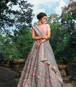 PLEASANT GREY SEQUINS, ZARI, AND THREAD EMBROIDERY NET SEMI STITCHED WEDDING LEHENGA
