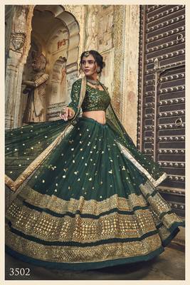 CAPTIVATING GREEN ZARI & SEQUINS EMBROIDERED NET WEDDING LEHENGA 2