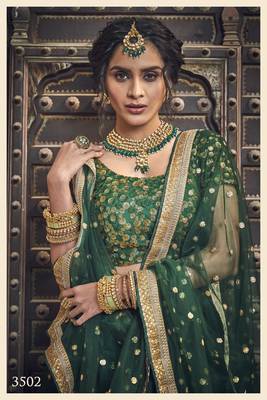 CAPTIVATING GREEN ZARI & SEQUINS EMBROIDERED NET WEDDING LEHENGA 4