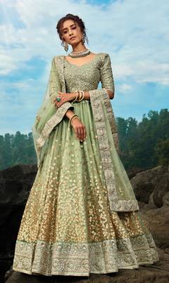 Seductive Green Dori And Sequins Embroidered Net Lehenga Choli For Bride 1