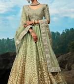 Seductive Green Dori And Sequins Embroidered Net Lehenga Choli For Bride