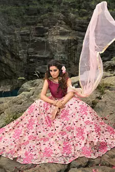 Lovable Light Pink And Wine Thread And Zari Embroidered Net Semi Stitched Lehenga Choli For Bride