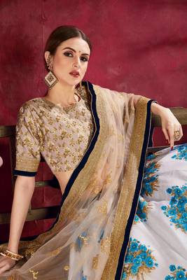 Beige embroidered silk semi stitched lehenga 4