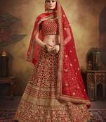 Red thread embroidery velvet semi stitched lehenga