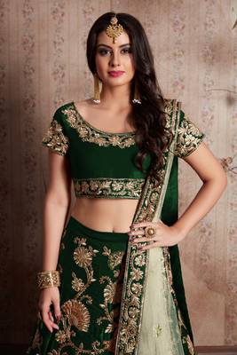 Green embroidered velvet semi stitched lehenga 3