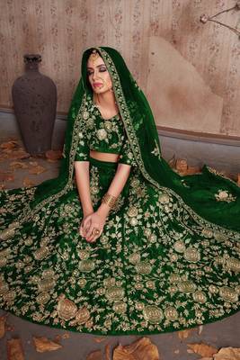 Green embroidered velvet semi stitched lehenga 3