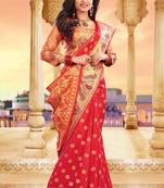 Red embroidered silk saree with blouse