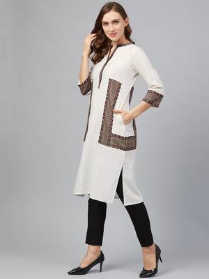 Cream printed rayon kurtas-and-kurtis 3