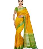 Yellow woven banarasi silk saree with blouse