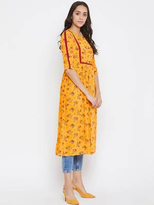 Yellow printed rayon kurtas-and-kurtis 4