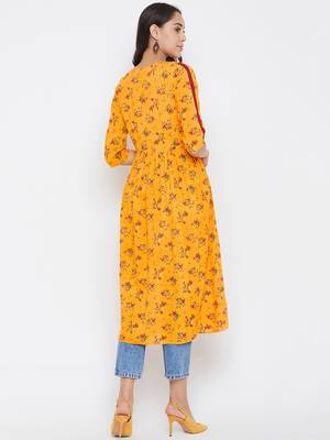 Yellow printed rayon kurtas-and-kurtis 5