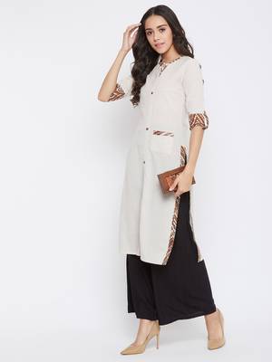 Beige self design cotton kurtas-and-kurtis 2