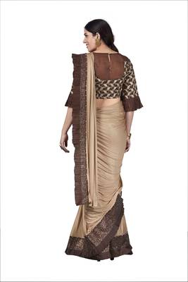 Beige brasso lycra saree with blouse 3