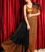 Black woven organza
 saree with blouse