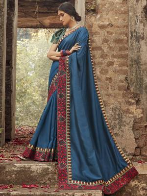 Teal embroidered dupion silk saree with blouse 1