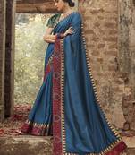 Teal embroidered dupion silk saree with blouse