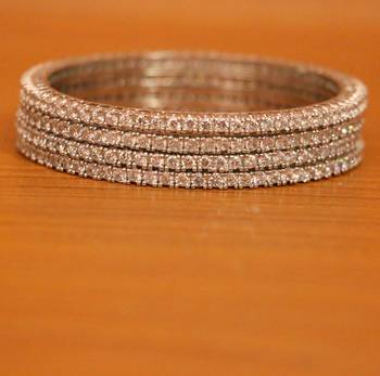White bangles-and-bracelets 1
