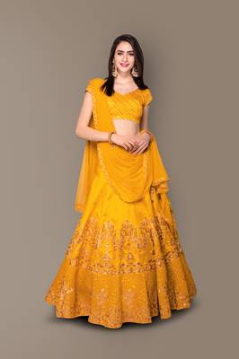 Yellow Zari and Sequins embroidered with stone work Silk Semi Stitched Bridal Lehenga 1