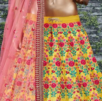 Yellow embroidered silk semi stitched lehenga 3