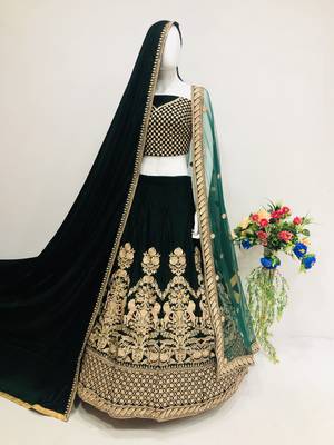 Green embroidered velvet semi stitched lehenga 1
