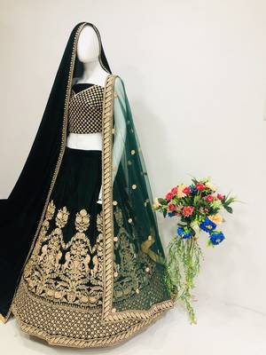 Green embroidered velvet semi stitched lehenga 2