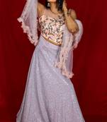 Silver Grey Sequin Lehenga with peach embroidered blouse with ruffle dupatta