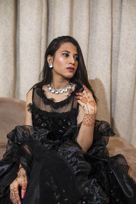 Black crop top with self sequin work and organza layered lehenga online 3