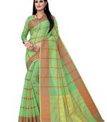 Green woven banarasi silk saree with blouse