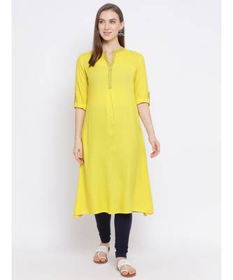 Women Yellow Cotton Solid A-line Kurta 1