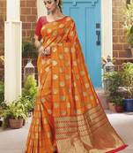 Orange woven banarasi silk saree with blouse