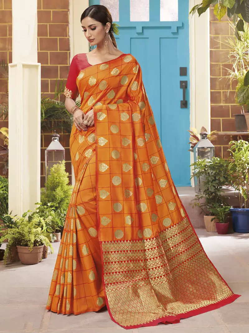 Orange woven banarasi silk saree with blouse
