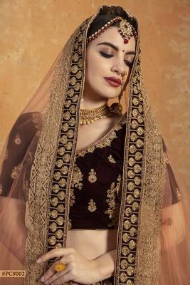 Maroon embroidered velvet semi stitched lehenga 2