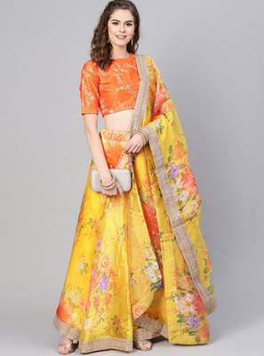 Yellow embroidered organza semi stitched lehenga 1