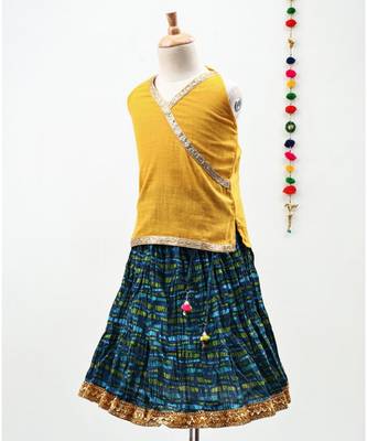 Green and Yellow cotton Lehenga with a Halter neck choli and a golden lace 2