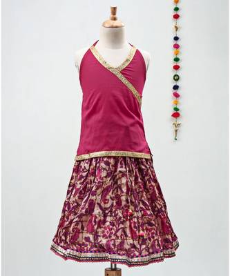 Pink cotton Paisley printed Lehenga with a halter neck choli and golden lace 1