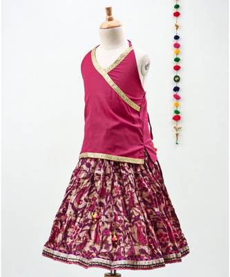 Pink cotton Paisley printed Lehenga with a halter neck choli and golden lace 2