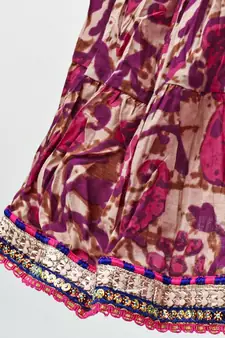 Pink cotton Paisley printed Lehenga with a halter neck choli and golden lace