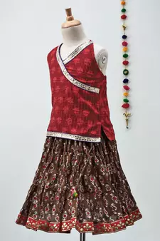 mahroon and red cotton Lehenga with a self print contrast halter neck choli and gota patti lace