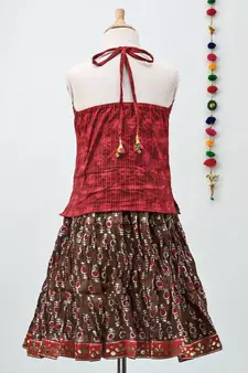 mahroon and red cotton Lehenga with a self print contrast halter neck choli and gota patti lace
