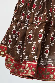 mahroon and red cotton Lehenga with a self print contrast halter neck choli and gota patti lace