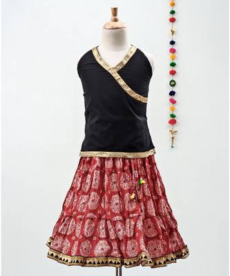red and black cotton printed lehenga with a contrast choli and a golden lace 1