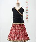 red and black cotton printed lehenga with a contrast choli and a golden lace