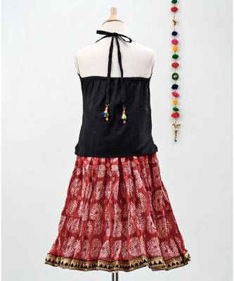 red and black cotton printed lehenga with a contrast choli and a golden lace 2
