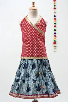 blue and red cotton leaf printed lehenga with a contrast choli and golden lace