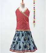 blue and red cotton leaf printed lehenga with a contrast choli and golden lace